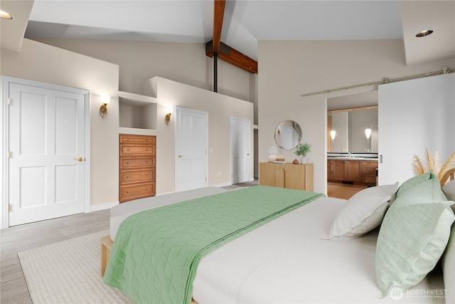 1409 Marietta Ave, Bellingham, WA 98226 - bedroom with beamed ceiling, high vaulted ceiling, connected bathroom, wood finished floors, and recessed lighting