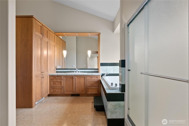1409 Marietta Ave, Bellingham, WA 98226 - bathroom with lofted ceiling, vanity, a garden tub, and a shower stall