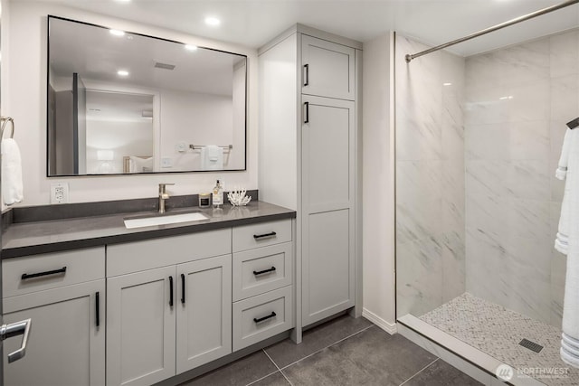 8046 40th Ave NE, Seattle, WA 98115 - bathroom featuring a marble finish shower, tile patterned flooring, vanity, and recessed lighting