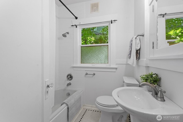 4628 Sunnyside Ave N, Seattle, WA 98103 - full bathroom featuring shower / bath combination and tile patterned flooring