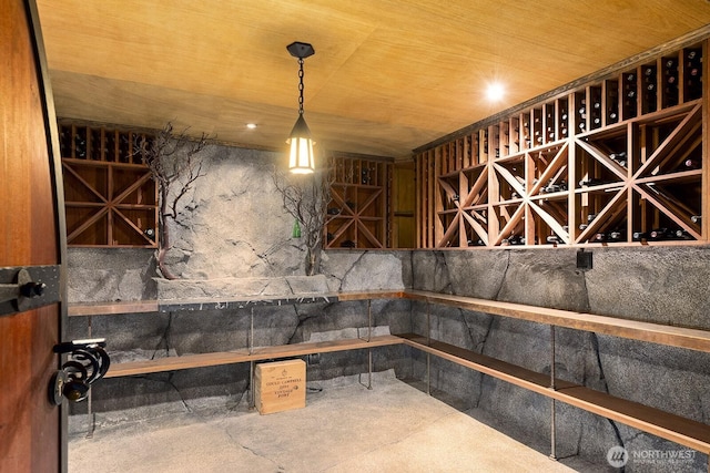 4628 Sunnyside Ave N, Seattle, WA 98103 - wine room with concrete block wall and wood ceiling
