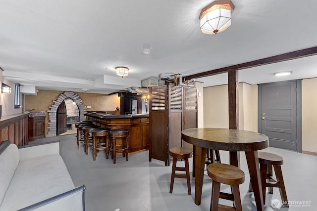 4628 Sunnyside Ave N, Seattle, WA 98103 - dining room featuring bar and concrete floors