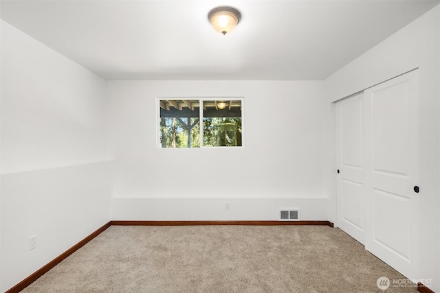 21310 SE 412th Pl, Enumclaw, WA 98022 - unfurnished bedroom featuring carpet flooring and a closet