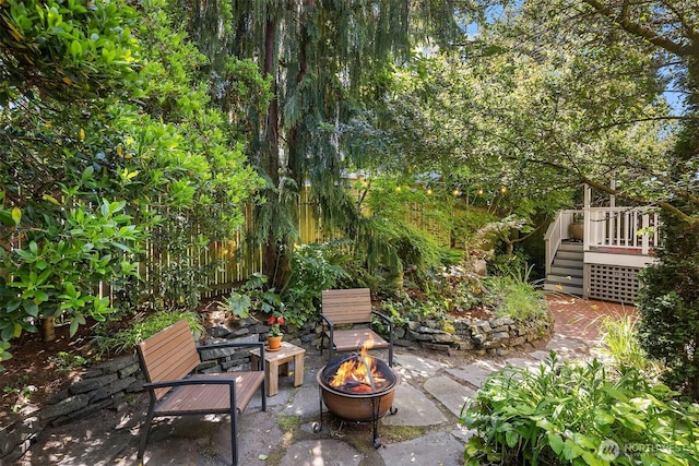 103 NW 62nd St, Seattle, WA 98107 - view of patio / terrace featuring a fire pit, a deck, and stairs