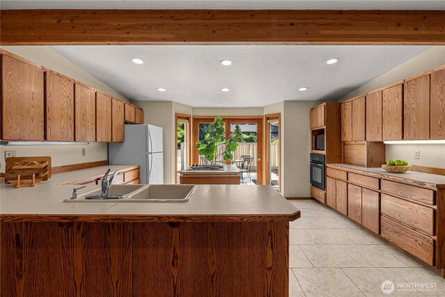 1840 Country Club Dr, East Wenatchee, WA 98802 - kitchen featuring freestanding refrigerator, a peninsula, oven, recessed lighting, and light countertops