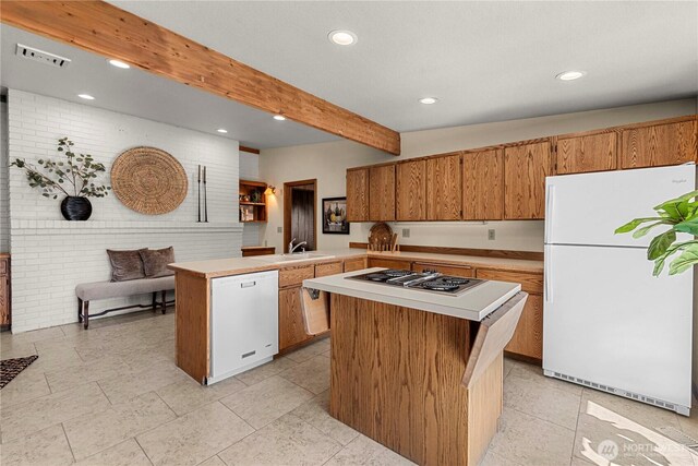 1840 Country Club Dr, East Wenatchee, WA 98802 - kitchen featuring white appliances, a peninsula, light countertops, recessed lighting, and beam ceiling