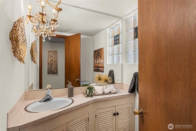 1840 Country Club Dr, East Wenatchee, WA 98802 - bathroom featuring vanity and a chandelier
