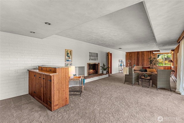 1840 Country Club Dr, East Wenatchee, WA 98802 - living area featuring carpet floors, a fireplace, and wood walls