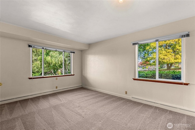 1840 Country Club Dr, East Wenatchee, WA 98802 - empty room with baseboard heating, carpet flooring, and healthy amount of natural light