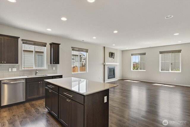 6729 283rd Pl NW, Stanwood, WA 98292 - kitchen with dishwasher, open floor plan, light countertops, dark brown cabinets, and recessed lighting
