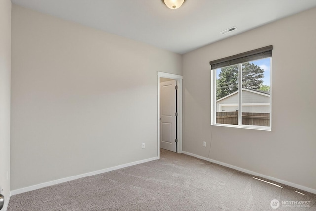 6729 283rd Pl NW, Stanwood, WA 98292 - unfurnished room with baseboards and light colored carpet