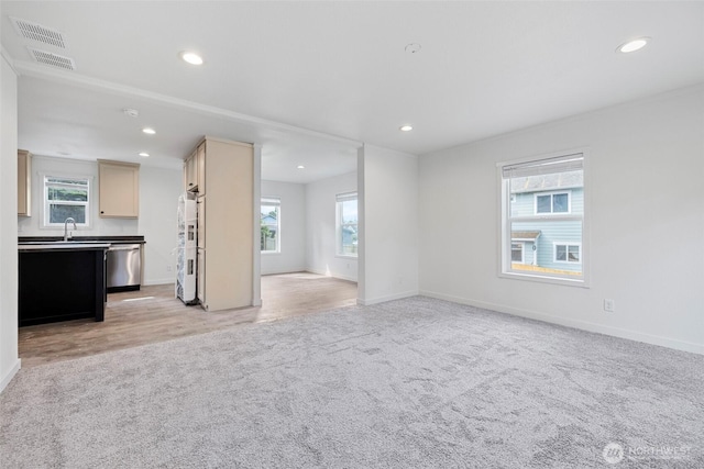 1264 Russell Dr, Coupeville, WA 98239 - unfurnished living room with light carpet and recessed lighting
