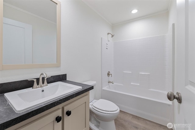 1264 Russell Dr, Coupeville, WA 98239 - full bathroom with wood finished floors, vanity, shower / washtub combination, and ornamental molding