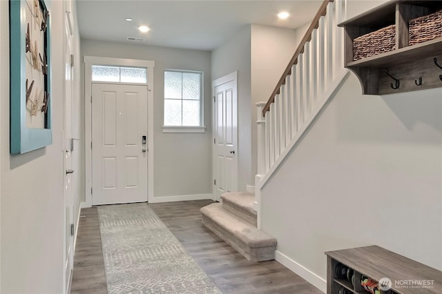 7804 208th Ave E, Bonney Lake, WA 98391 - entrance foyer with wood finished floors, stairway, and recessed lighting