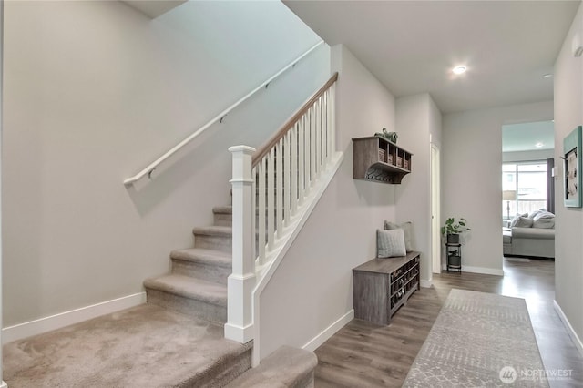 7804 208th Ave E, Bonney Lake, WA 98391 - staircase featuring wood finished floors and recessed lighting
