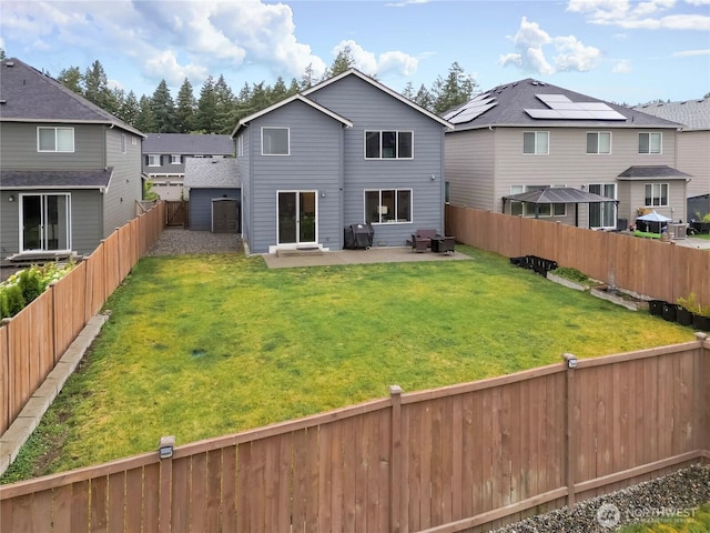 7804 208th Ave E, Bonney Lake, WA 98391 - back of property featuring a patio area, a fenced backyard, and a residential view