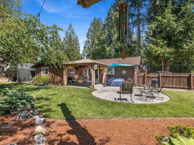 25107 Old Owen Rd, Monroe, WA 98272 - back of house featuring a patio and a hot tub