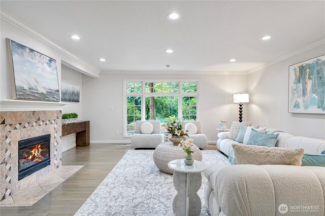 5265 140th Ave NE, Bellevue, WA 98005 - living area with ornamental molding, recessed lighting, wood finished floors, and a fireplace