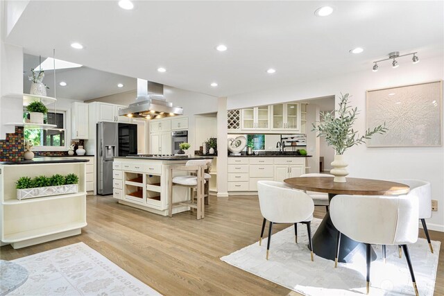 5265 140th Ave NE, Bellevue, WA 98005 - dining space with light wood finished floors and recessed lighting