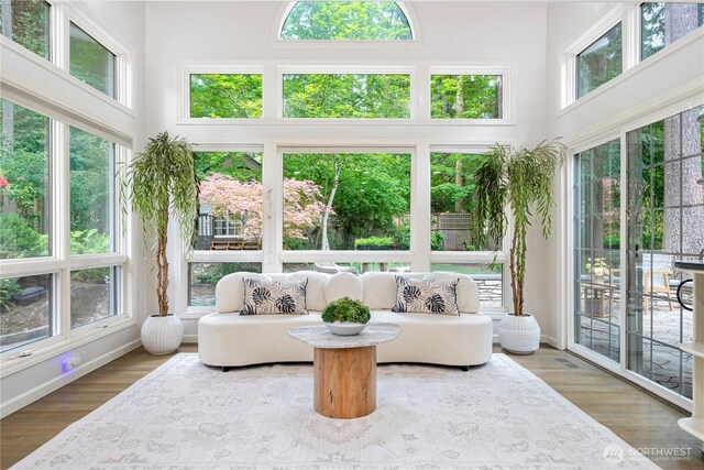 5265 140th Ave NE, Bellevue, WA 98005 - sunroom featuring a towering ceiling and wood finished floors