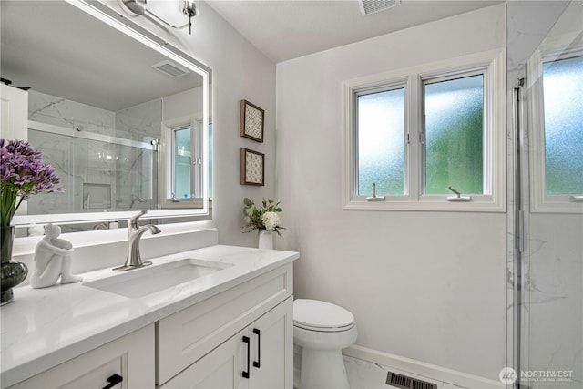 5265 140th Ave NE, Bellevue, WA 98005 - full bath featuring marble look tiles, vanity, a marble finish shower, and healthy amount of natural light