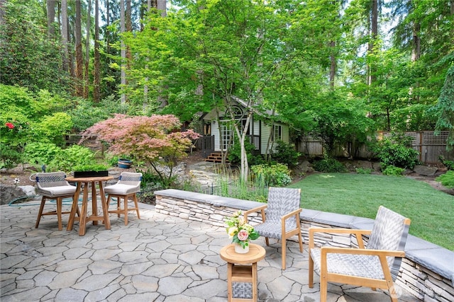 5265 140th Ave NE, Bellevue, WA 98005 - fenced backyard featuring an outbuilding and a patio area
