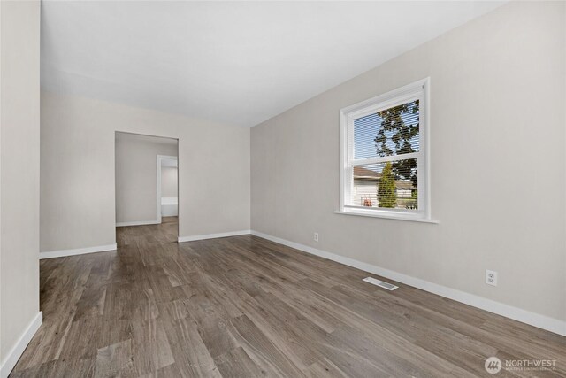 1925 Lombard Unit A, Everett, WA 98201 - spare room featuring wood finished floors and baseboards