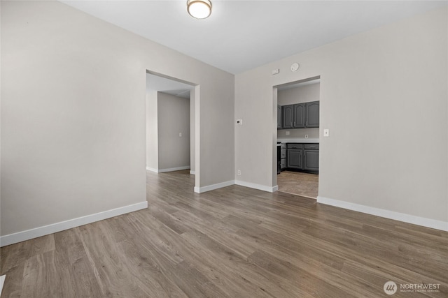 1925 Lombard Unit A, Everett, WA 98201 - unfurnished room with wood finished floors and baseboards