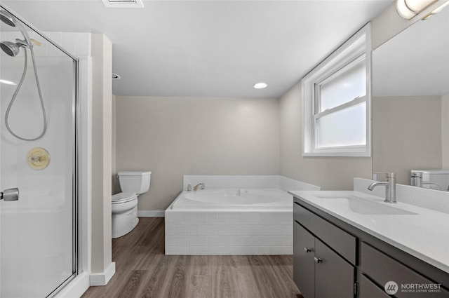 1925 Lombard Unit A, Everett, WA 98201 - bathroom with vanity, a shower stall, wood finished floors, and a garden tub