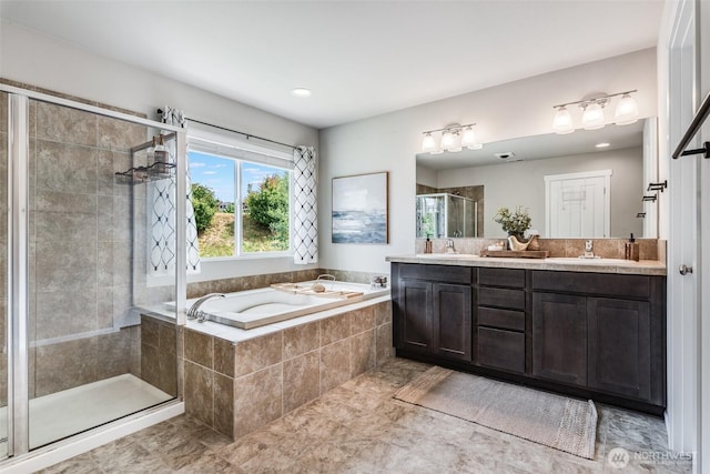 2726 Kacie Ct NE, Lacey, WA 98516 - bathroom with a garden tub, a shower stall, double vanity, and tile patterned flooring