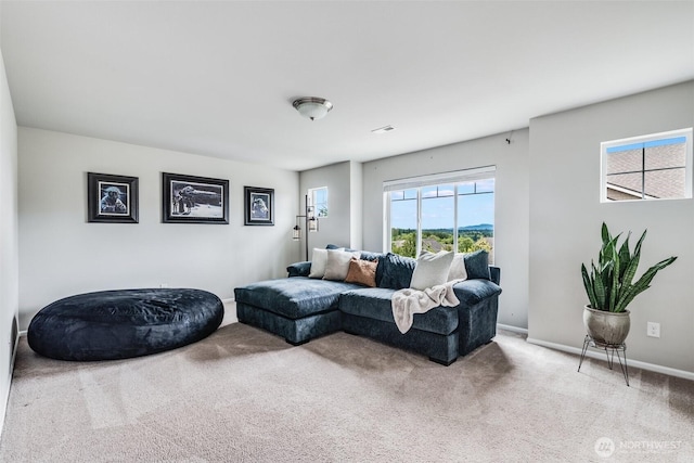 2726 Kacie Ct NE, Lacey, WA 98516 - carpeted living room featuring baseboards
