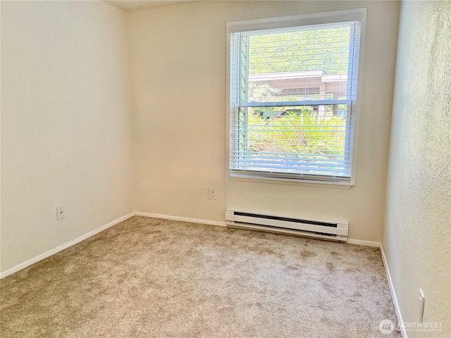 147 S 329th Pl Unit A, Federal Way, WA 98003 - carpeted spare room featuring a baseboard radiator and baseboards