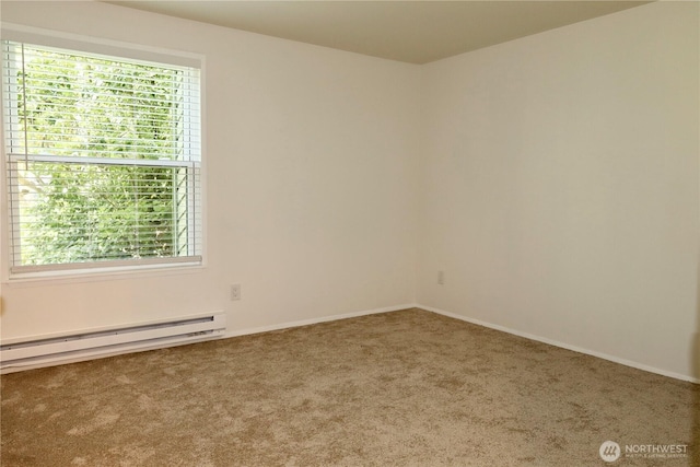 147 S 329th Pl Unit A, Federal Way, WA 98003 - empty room featuring a baseboard radiator, carpet, and plenty of natural light