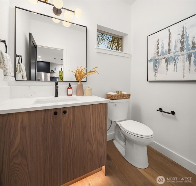9047 Dibble Ave NW, Seattle, WA 98117 - half bath featuring wood finished floors and vanity