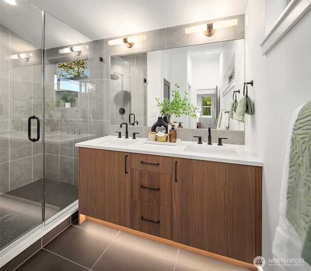 9047 Dibble Ave NW, Seattle, WA 98117 - bathroom with double vanity, a stall shower, and tile patterned flooring