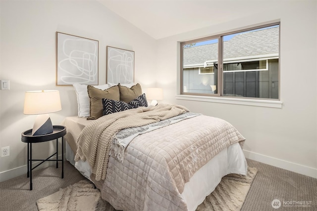9047 Dibble Ave NW, Seattle, WA 98117 - carpeted bedroom with vaulted ceiling and baseboards