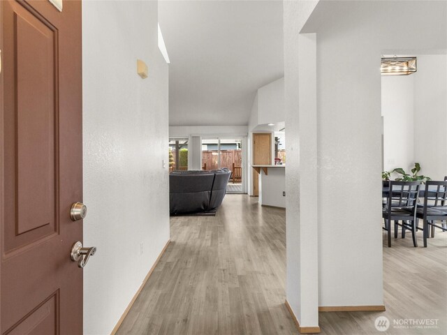 5415 Komachin Loop SE, Lacey, WA 98513 - foyer entrance with light wood finished floors and lofted ceiling