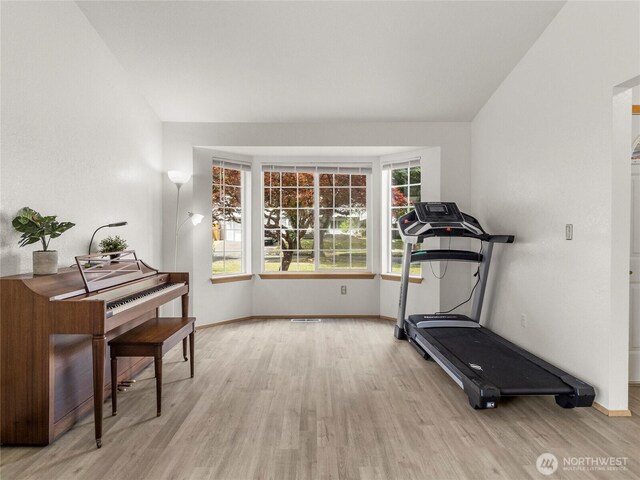 5415 Komachin Loop SE, Lacey, WA 98513 - exercise room with wood finished floors and lofted ceiling