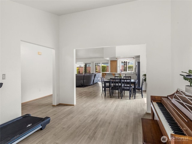 5415 Komachin Loop SE, Lacey, WA 98513 - dining room featuring a towering ceiling and wood finished floors