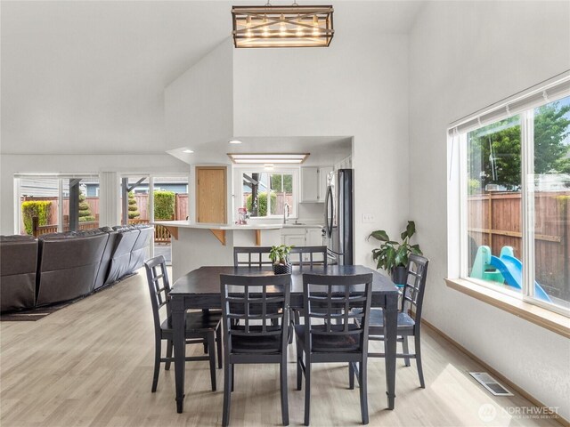 5415 Komachin Loop SE, Lacey, WA 98513 - dining area with a high ceiling and light wood finished floors