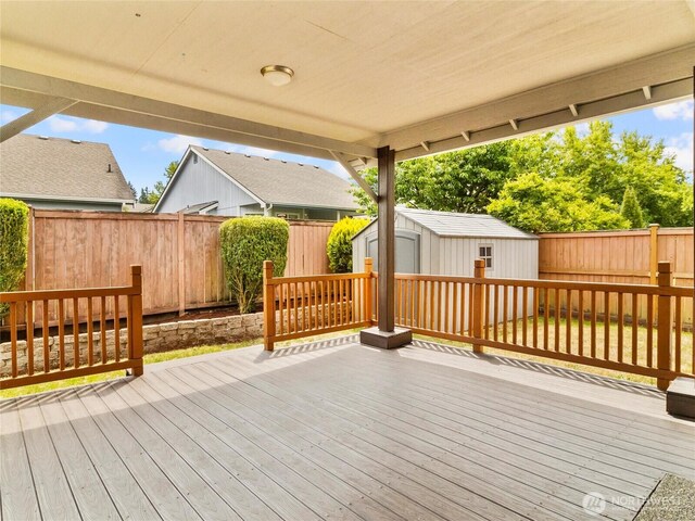 5415 Komachin Loop SE, Lacey, WA 98513 - wooden deck with a storage shed and a fenced backyard