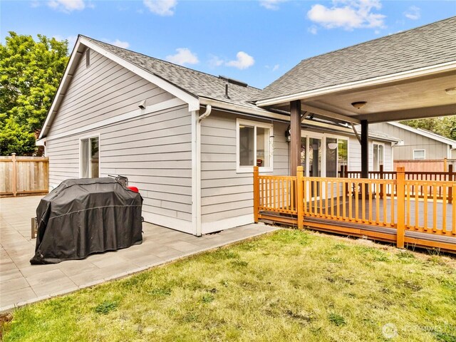 5415 Komachin Loop SE, Lacey, WA 98513 - back of house featuring a deck, roof with shingles, and a patio