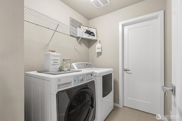 13506 196th Ave SE, Monroe, WA 98272 - washroom with washer and dryer and light carpet