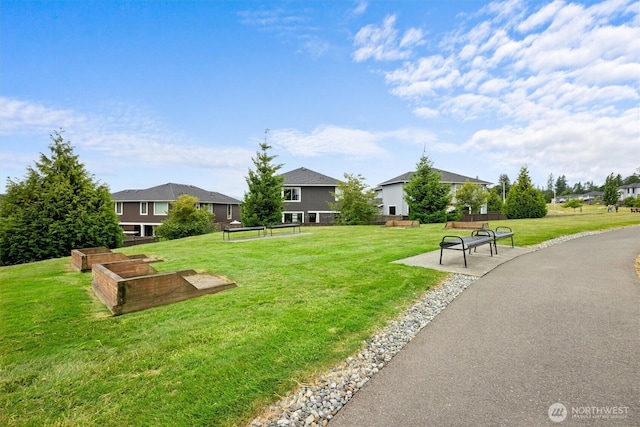 13506 196th Ave SE, Monroe, WA 98272 - surrounding community with a yard and a garden