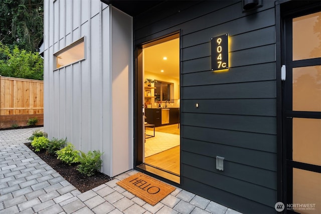 9047 Dibble Ave NW Unit C, Seattle, WA 98117 - property entrance featuring a sink and board and batten siding