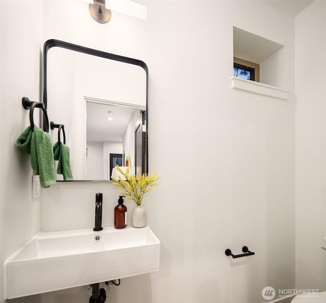 9047 Dibble Ave NW Unit C, Seattle, WA 98117 - half bathroom with a sink