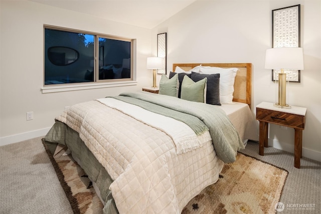 9047 Dibble Ave NW Unit C, Seattle, WA 98117 - carpeted bedroom with baseboards and vaulted ceiling