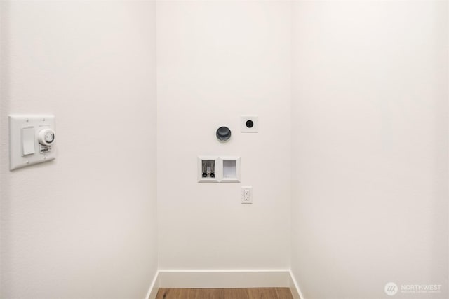 9047 Dibble Ave NW Unit C, Seattle, WA 98117 - laundry room with hookup for an electric dryer, hookup for a washing machine, hookup for a gas dryer, and light wood-type flooring