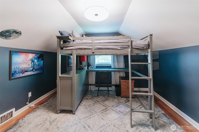1325 SW 120th St, Burien, WA 98146 - bedroom with vaulted ceiling, wood finished floors, and an office area