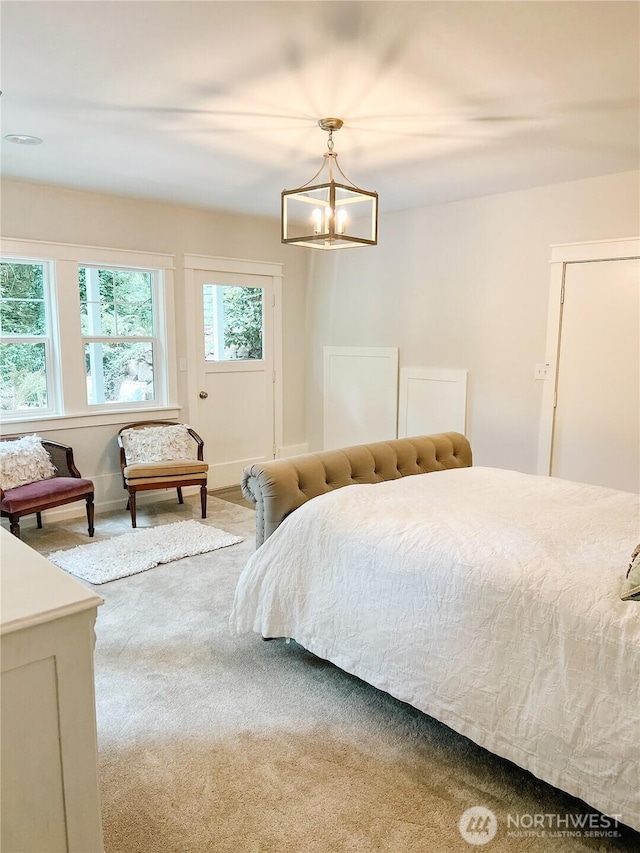 1325 SW 120th St, Burien, WA 98146 - bedroom with carpet flooring and a chandelier